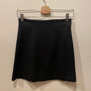 Reformation mini skirt with double slit/cut outs in the front